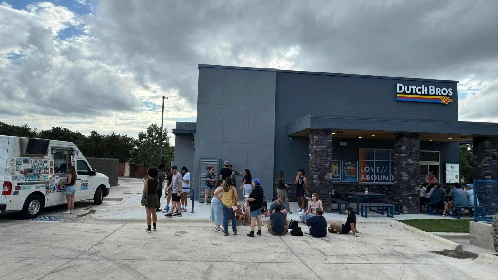 employees gather around the Frosty Brothers dessert truck during a Dutch Bros Coffee employee appreciation event in San Antonio, Texas