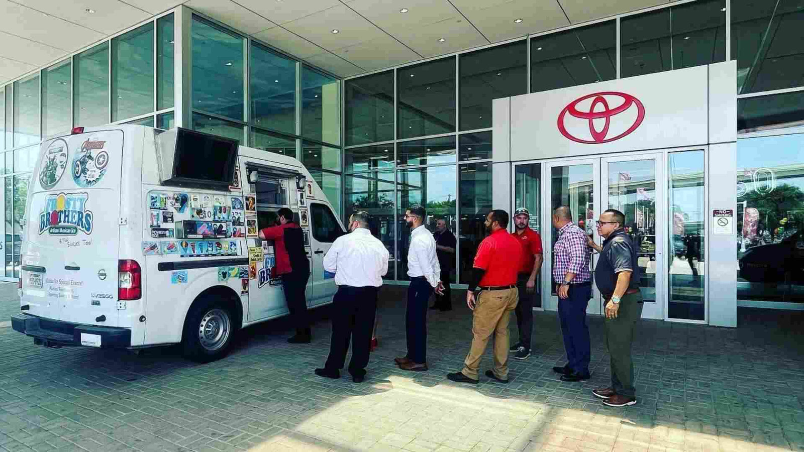Toyota employees lined up at Frosty Brothers ice cream truck during a corporate appreciation event in San Antonio, Texas.