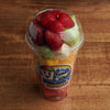 Fresh fruit cup with strawberries, cantaloupe, cucumber, watermelon, and pineapple, mango prepared daily at Frosty Brothers in San Antonio, TX.