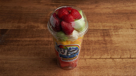 Fresh fruit cup with strawberries, cantaloupe, cucumber, watermelon, and pineapple, mango prepared daily at Frosty Brothers in San Antonio, TX.