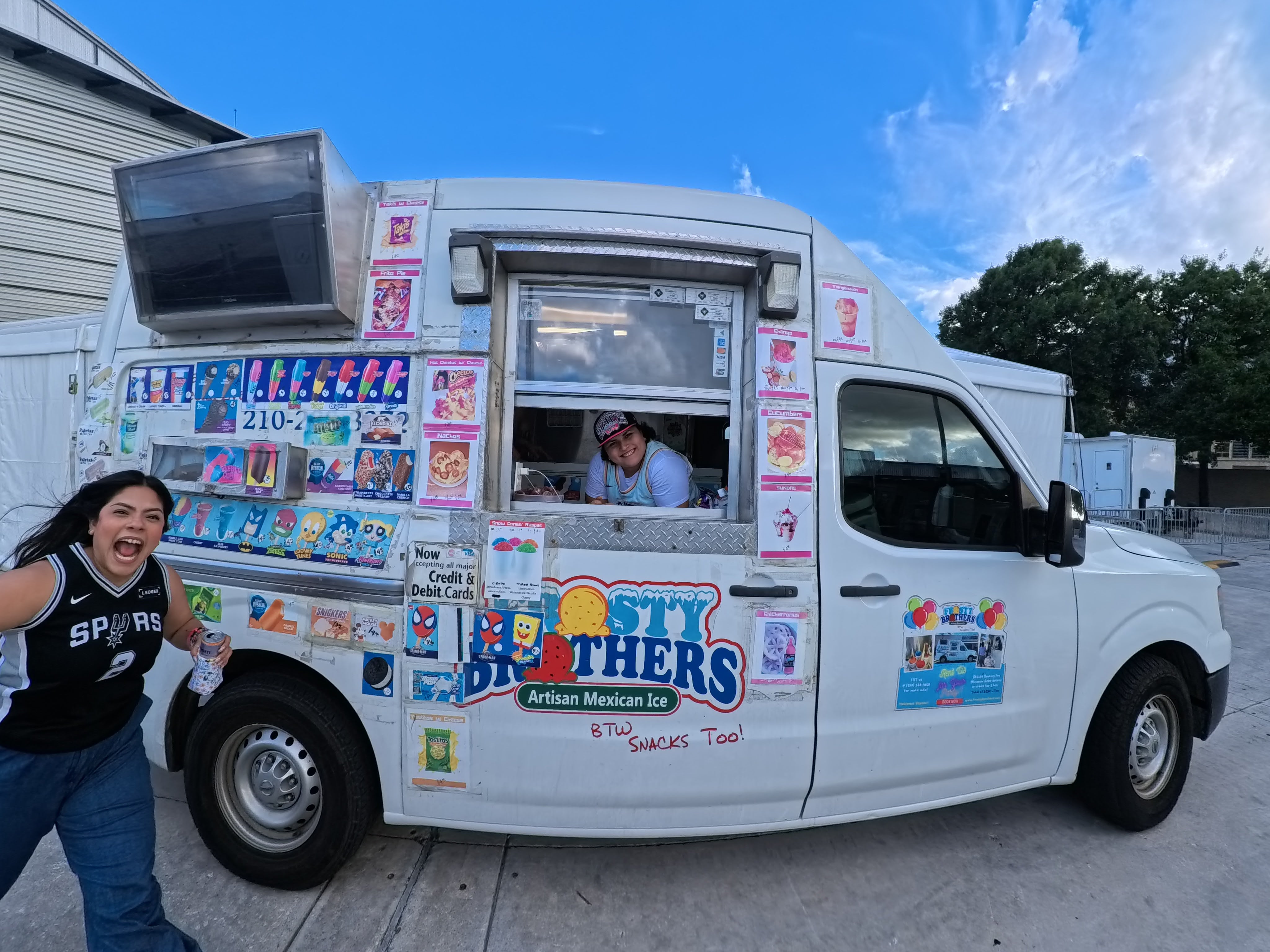 Frosty Brothers Ice Cream Truck serving shaved ice, snacks, and frozen treats at a San Antonio Spurs community event and the Frosty Brothers team.