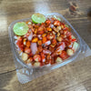 Traditional Mexican Tostilocos made with chips, cucumber, jicama, peanuts, Japanese peanuts, chamoy, lime, and clamato at Frosty Brothers.