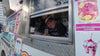 Video of Carlos Sr. and Carlos Jr. serving customers from the Frosty Brothers Ice Cream Truck at a San Antonio Spurs event, showcasing the truck menu, shaved ice, snacks, and family-owned catering service in San Antonio, Texas.
